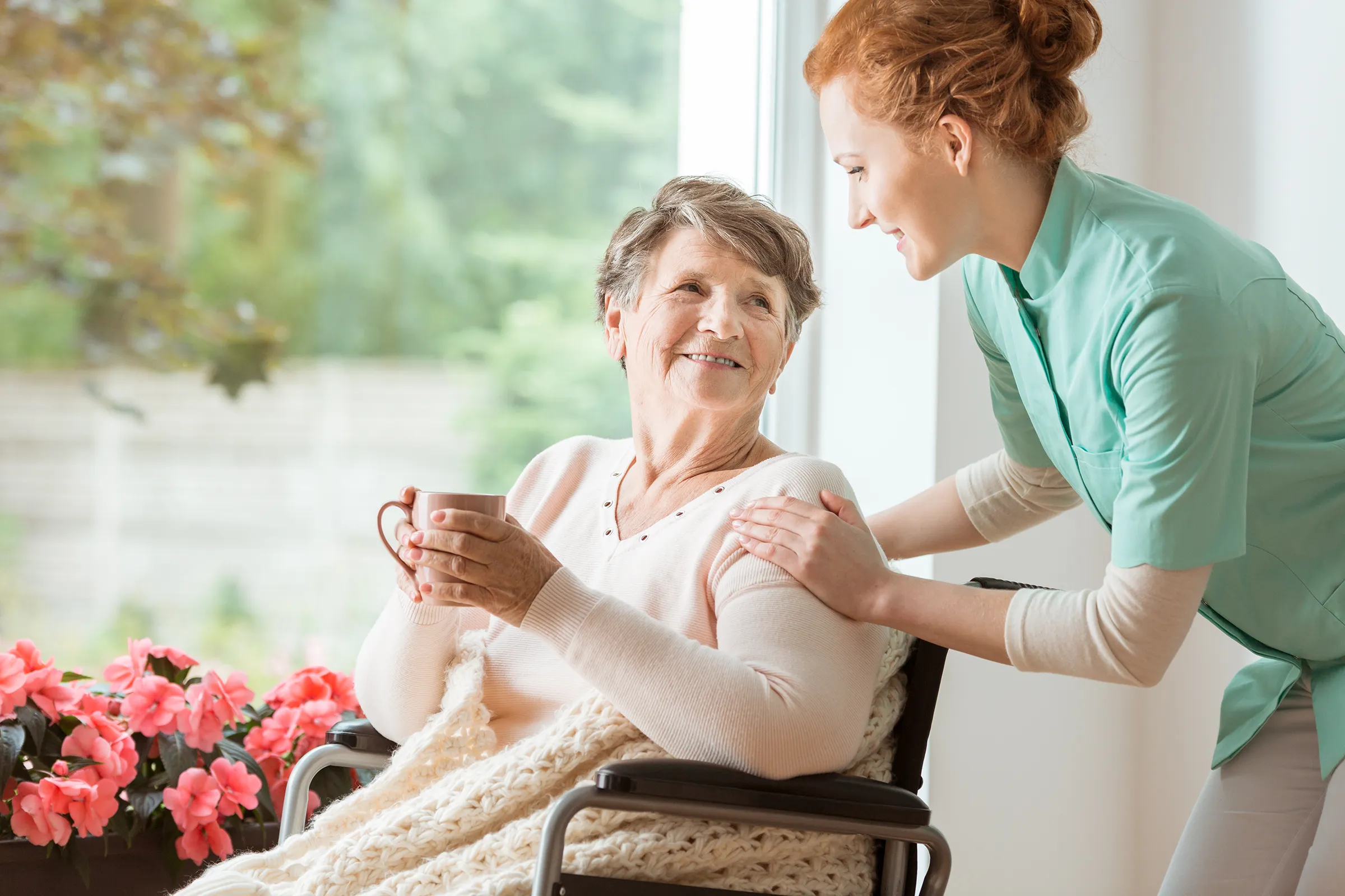 senior-woman-caregiver-handson